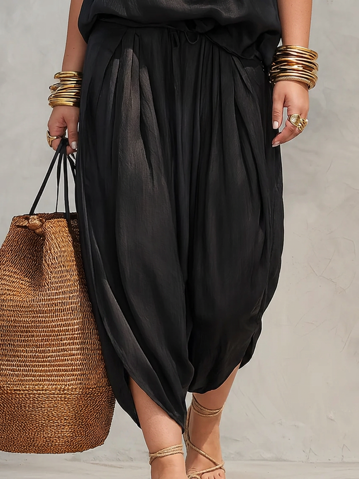 Aurora – Sleeveless top with American collar and pleated pants